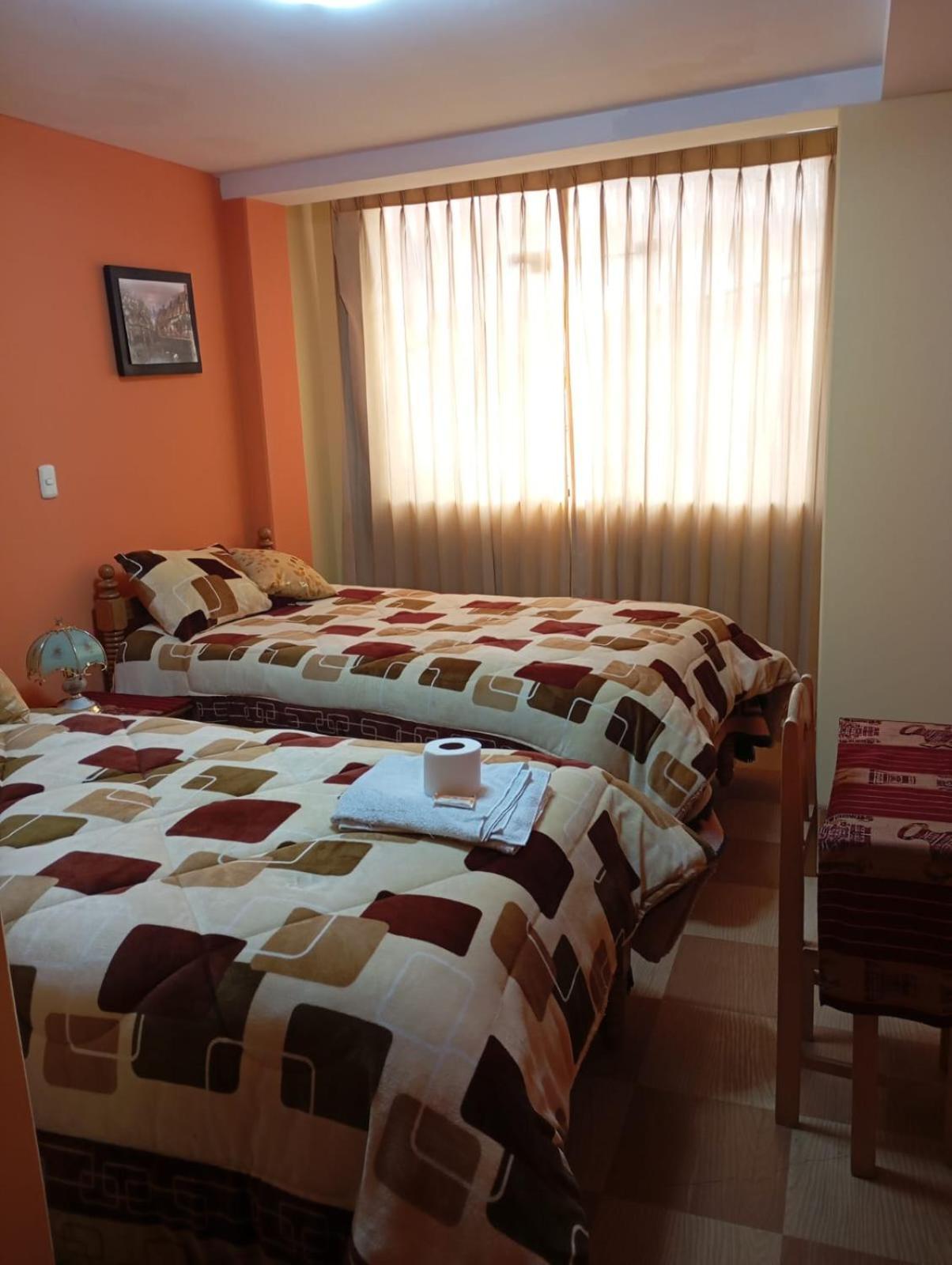 Hostal Vista Al Lago Titicaca Puno Bagian luar foto