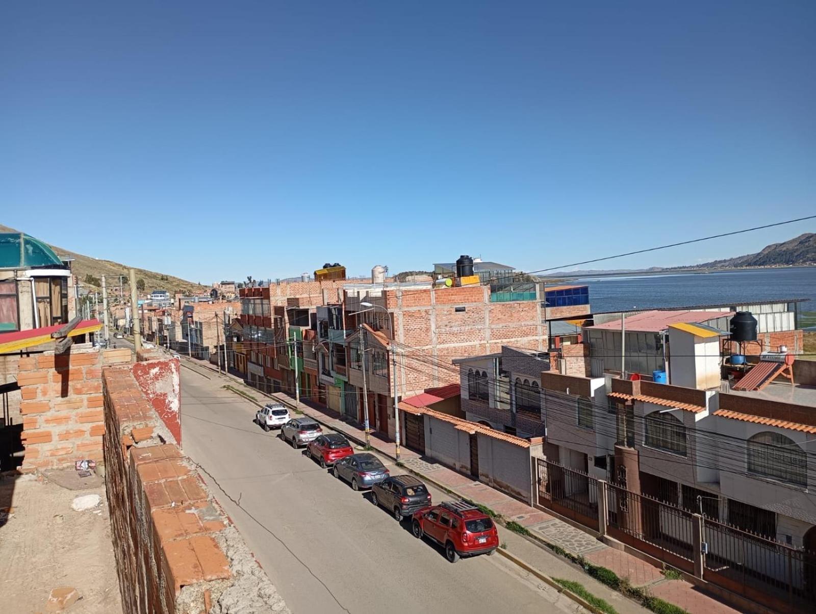Hostal Vista Al Lago Titicaca Puno Bagian luar foto