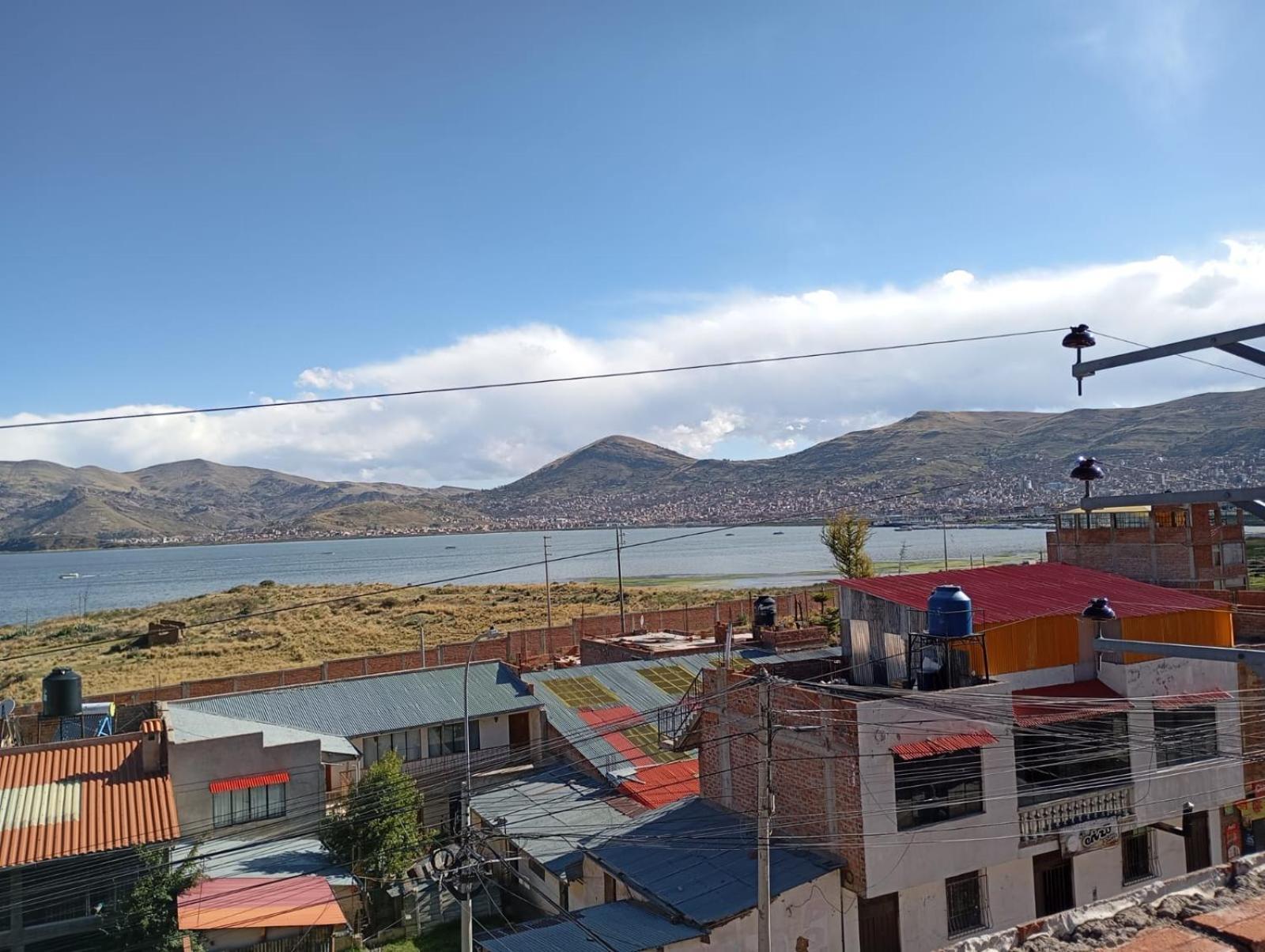 Hostal Vista Al Lago Titicaca Puno Bagian luar foto